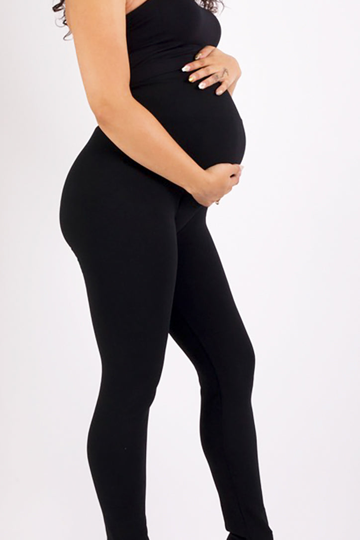 The Maternity Black Yoga Tummy Control Legging fits up to PLUS